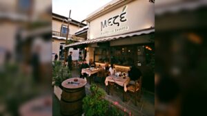 Outdoor seating area at Meze Taverna in Limassol, Cyprus, a traditional tavern known for authentic Cypriot meze, generous portions and local hospitality.